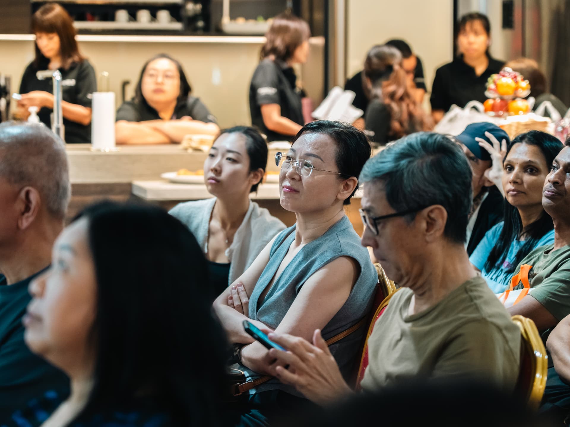 Homeowners listening attentively during a Reno Talk